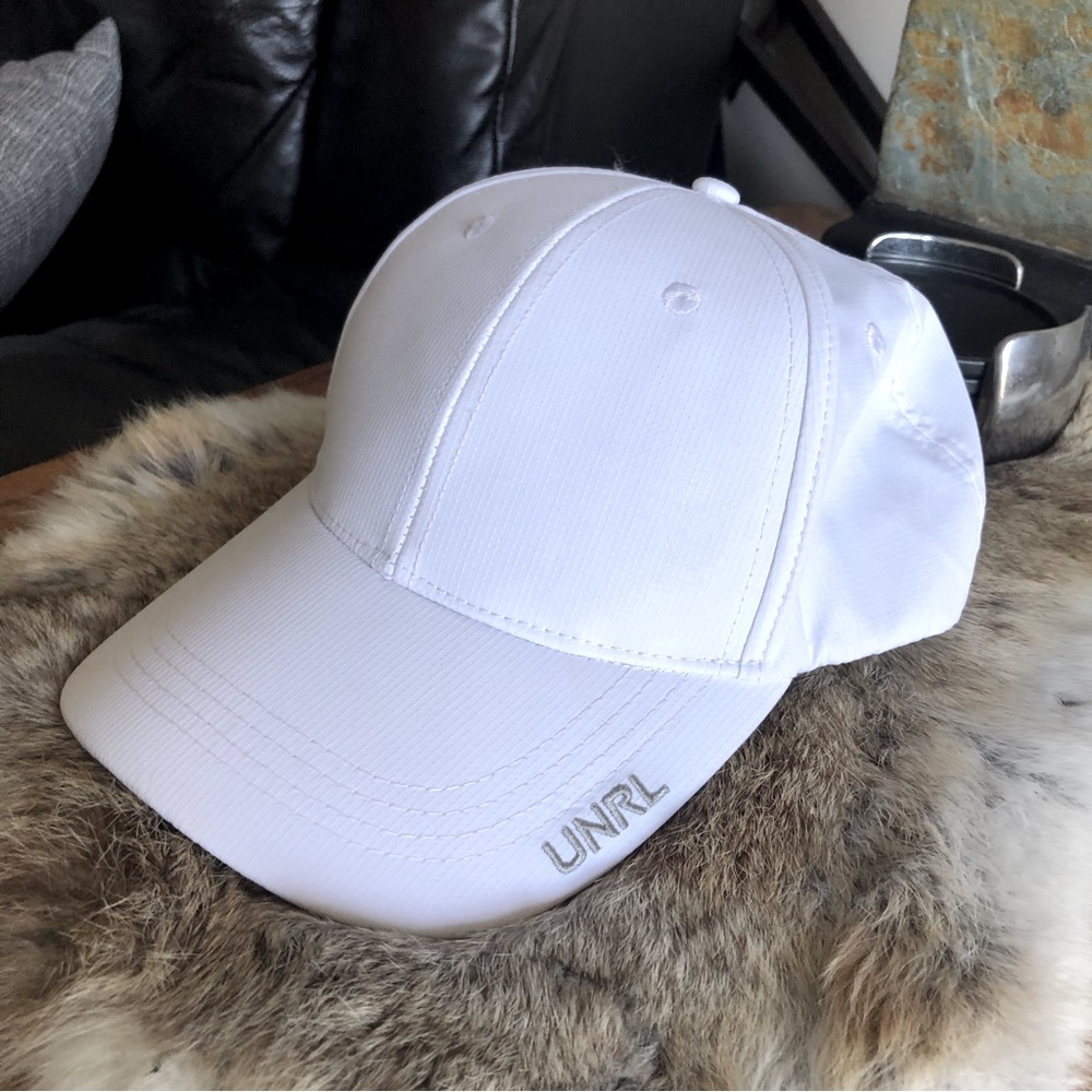 Worn once. UNRL white snapback Baseball hat.